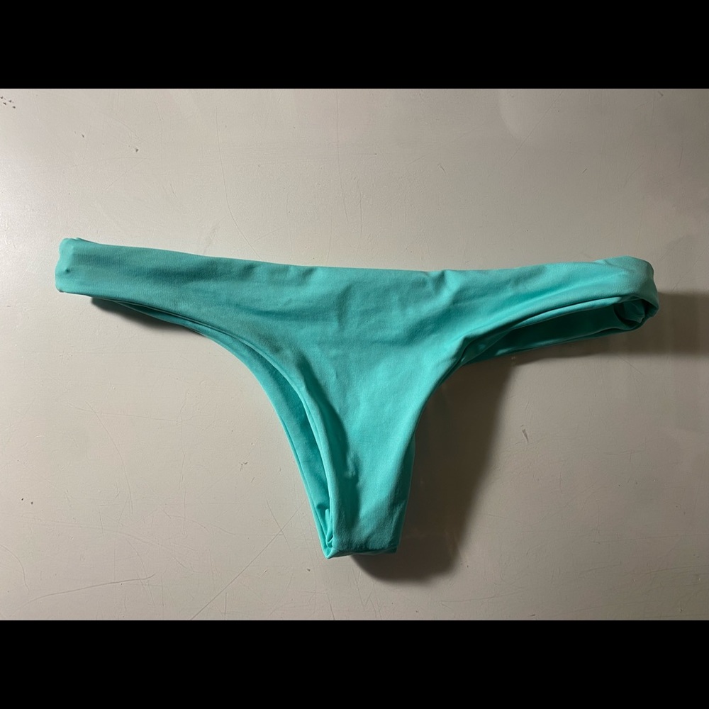 Bikini bottoms, Unsure of brand, fit as an extra small, the color blue.